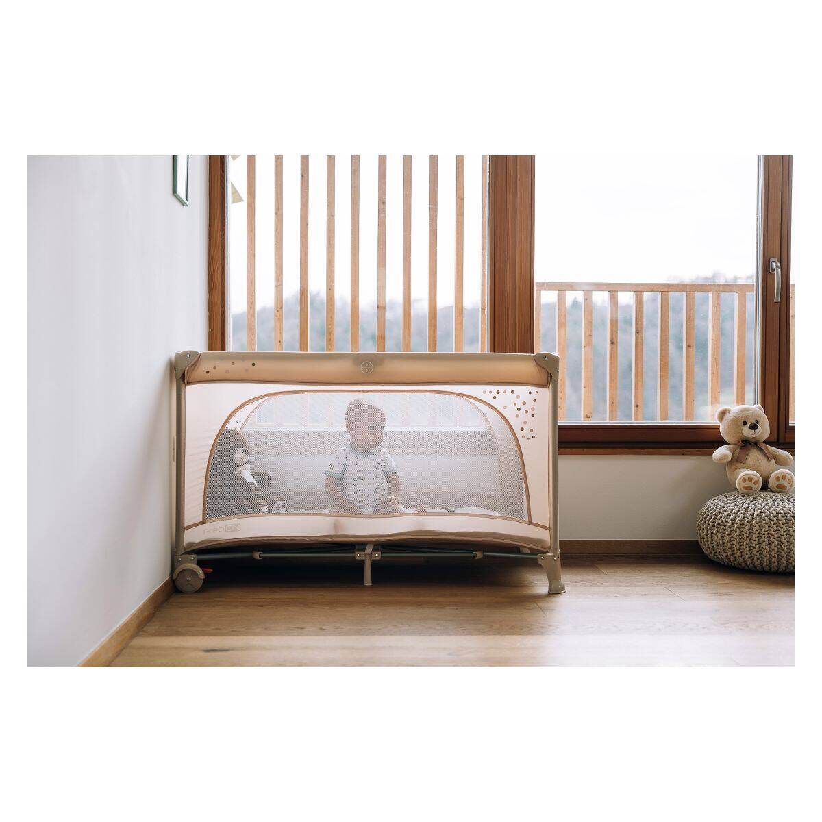 FreeON prenosna postelja Nook z odprtino beige