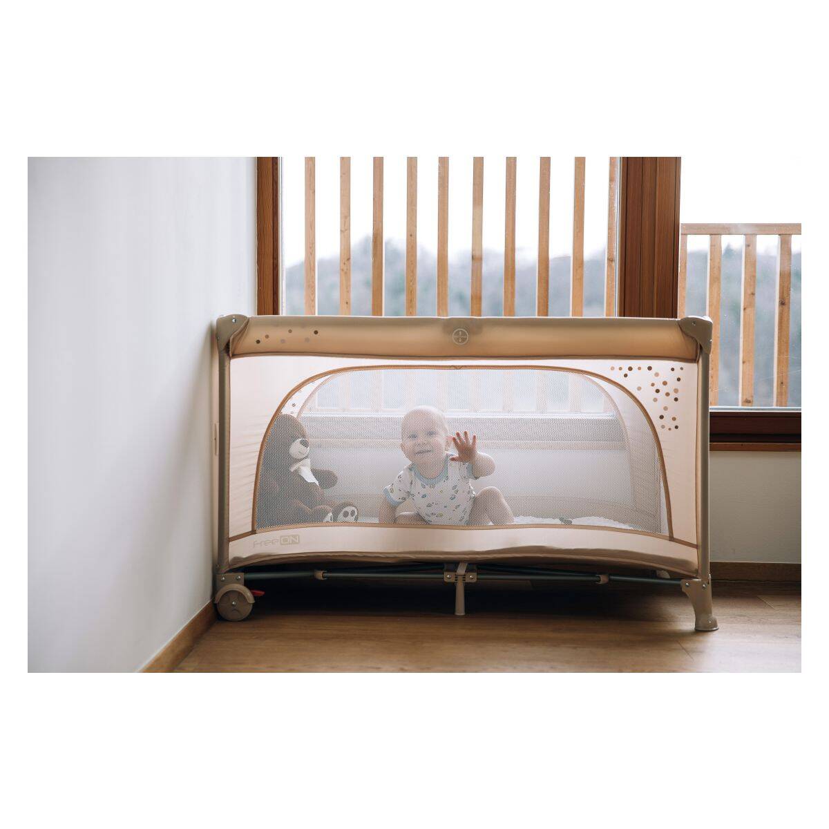 FreeON prenosna postelja Nook z odprtino beige