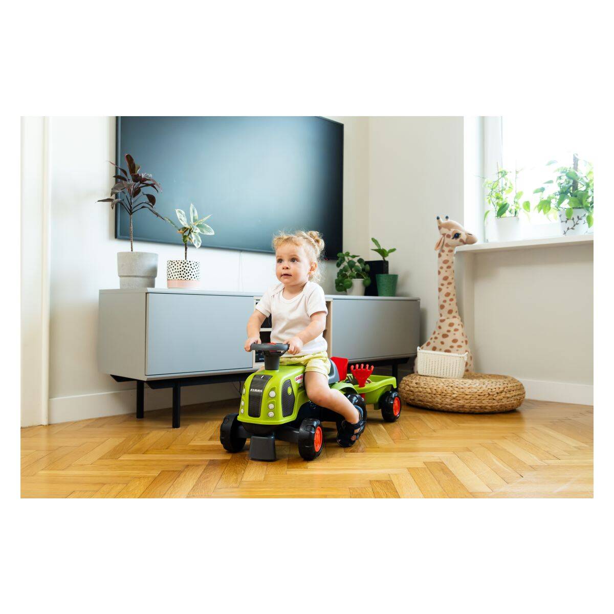 Falk traktor poganjalec Baby Claas s prikolico