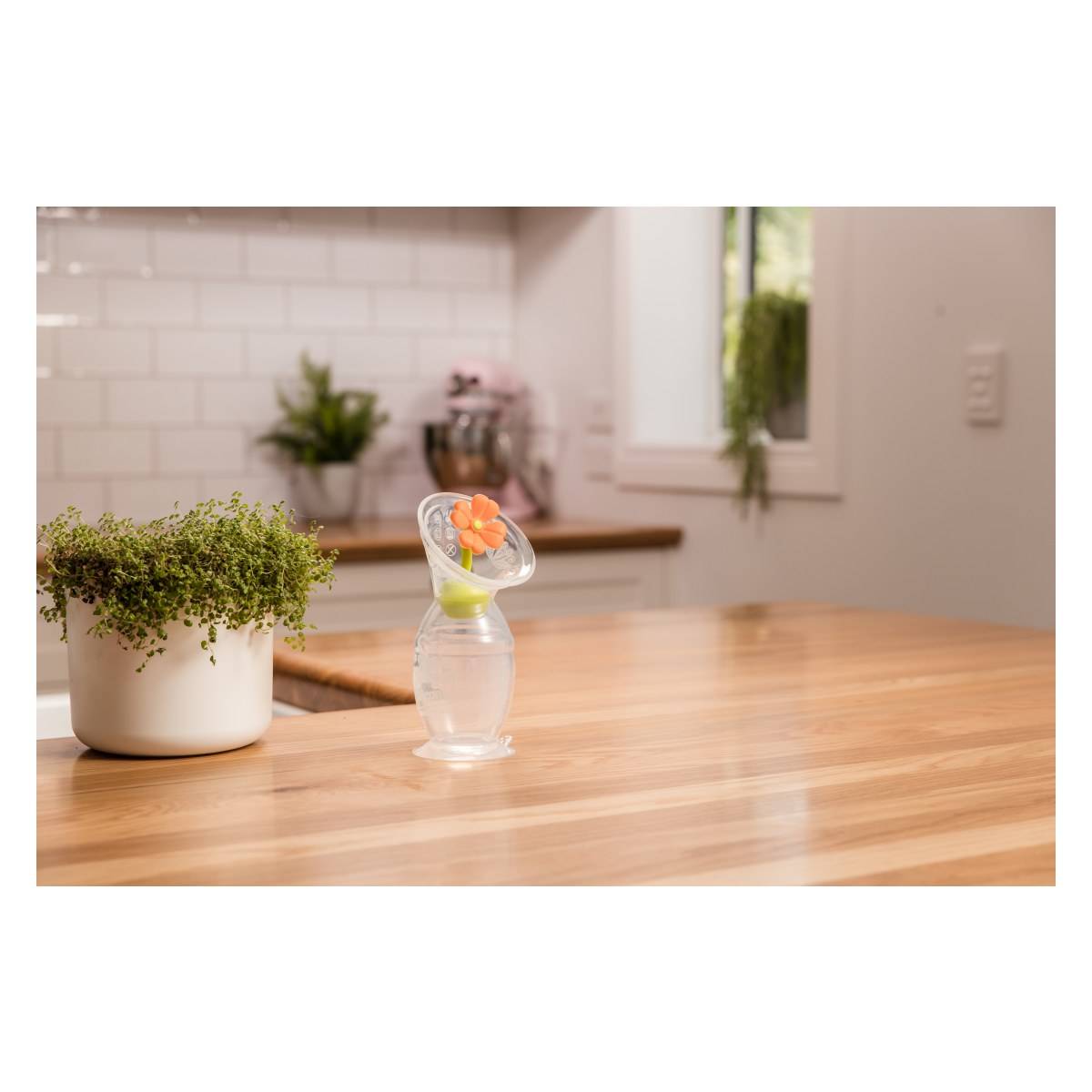 HAAKAA ručna izdajalica silikon 2. gen 100 ml + čep Flower Orange